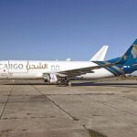 Oman Air Cargo, Hondo 12-07-25 on runway, plane facing left of image