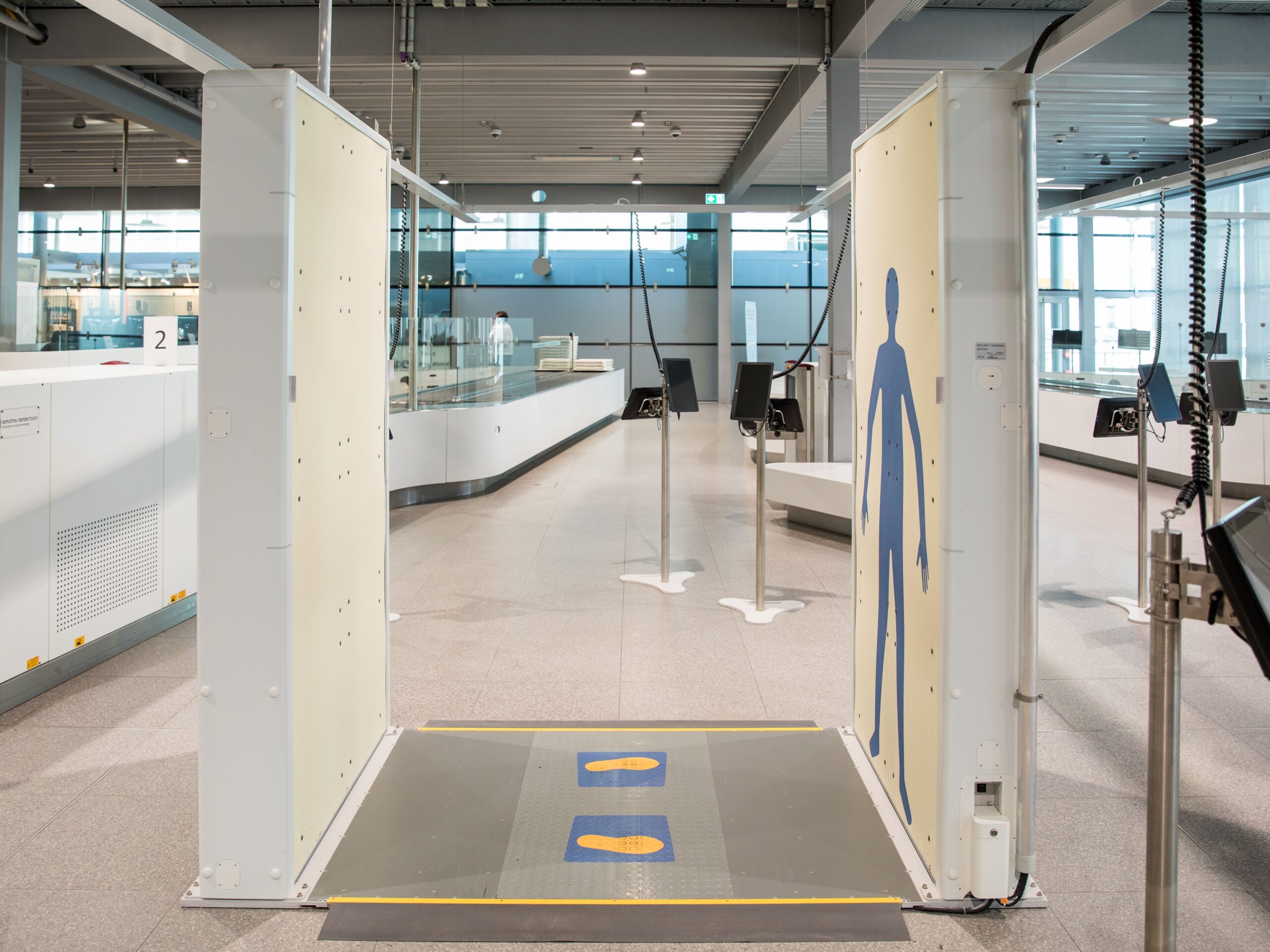 Body scanner at the Cologne Bonn Airport. Only one person in the distant background.