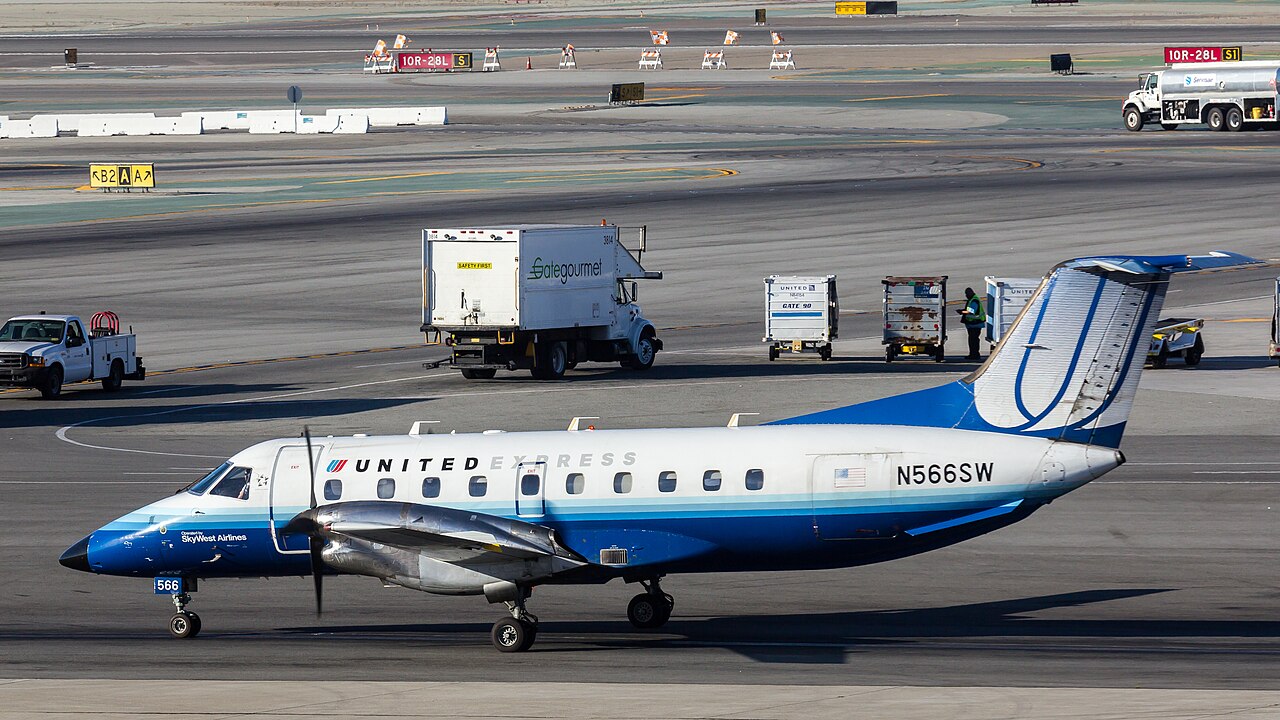 United Express plane on ground photographed from the side.