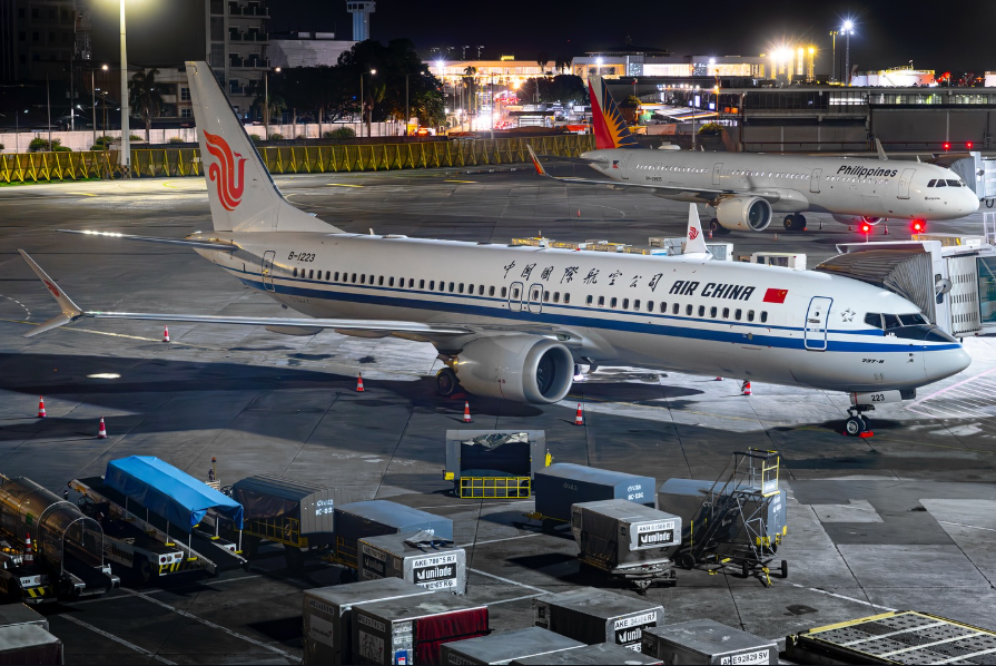 Air China Boeing aircraft at Manila airport, on the tarmac.
