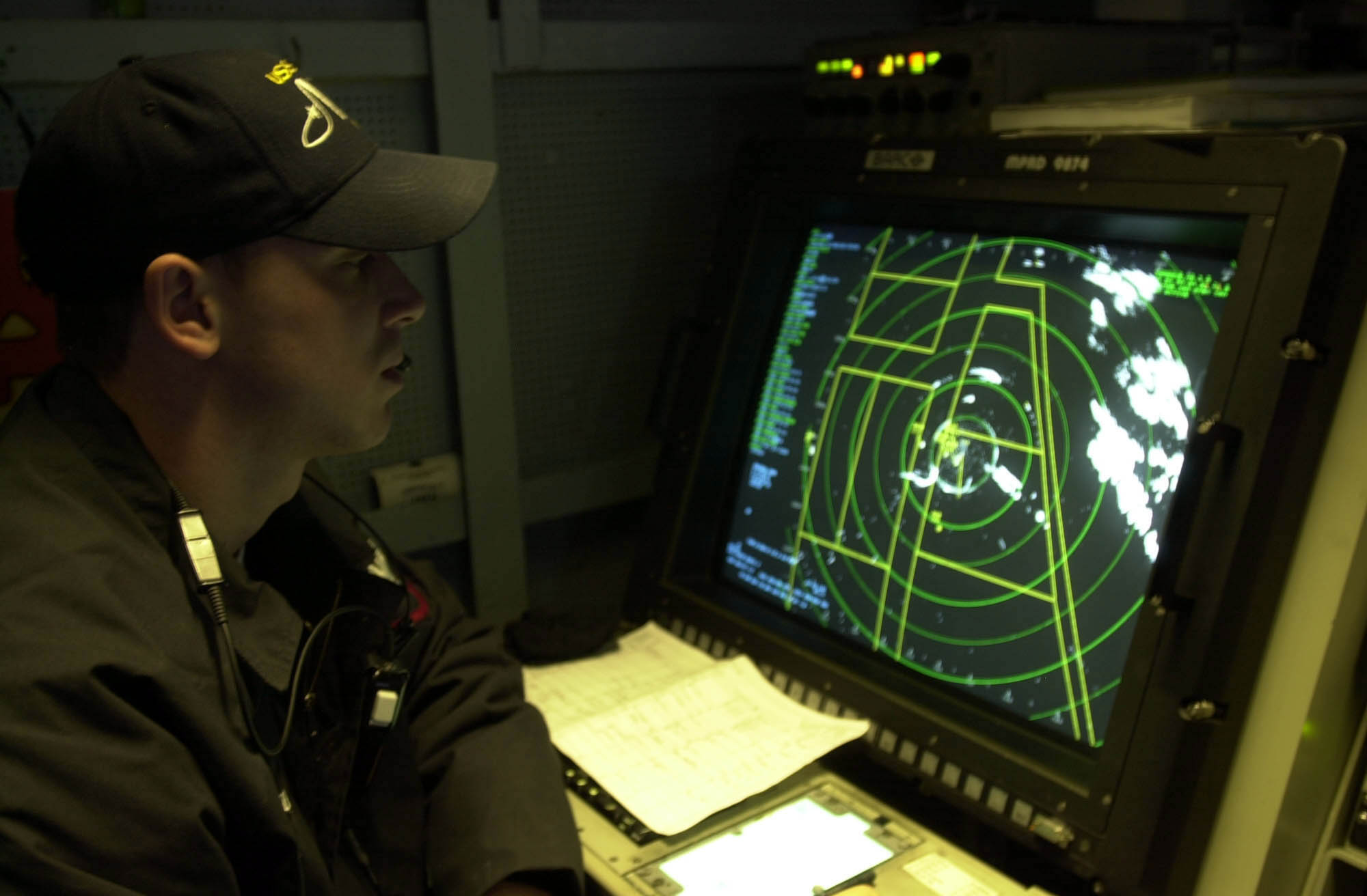  Air Traffic Controller 3rd Class Sean Russell of San Antonio, Texas, stands as Case One Supervisor in Carrier Air Traffic Control Center (CATCC) during flight operations aboard the aircraft carrier USS Nimitz (CVN 68). The Case One Supervisor is responsible for all personnel handling aircraft in CATCC during low visibility and night flight operations. Nimitz is currently conducting Tailored Ships Training Availability I/II/III and Final Exercise Problem off the coast of southern California.