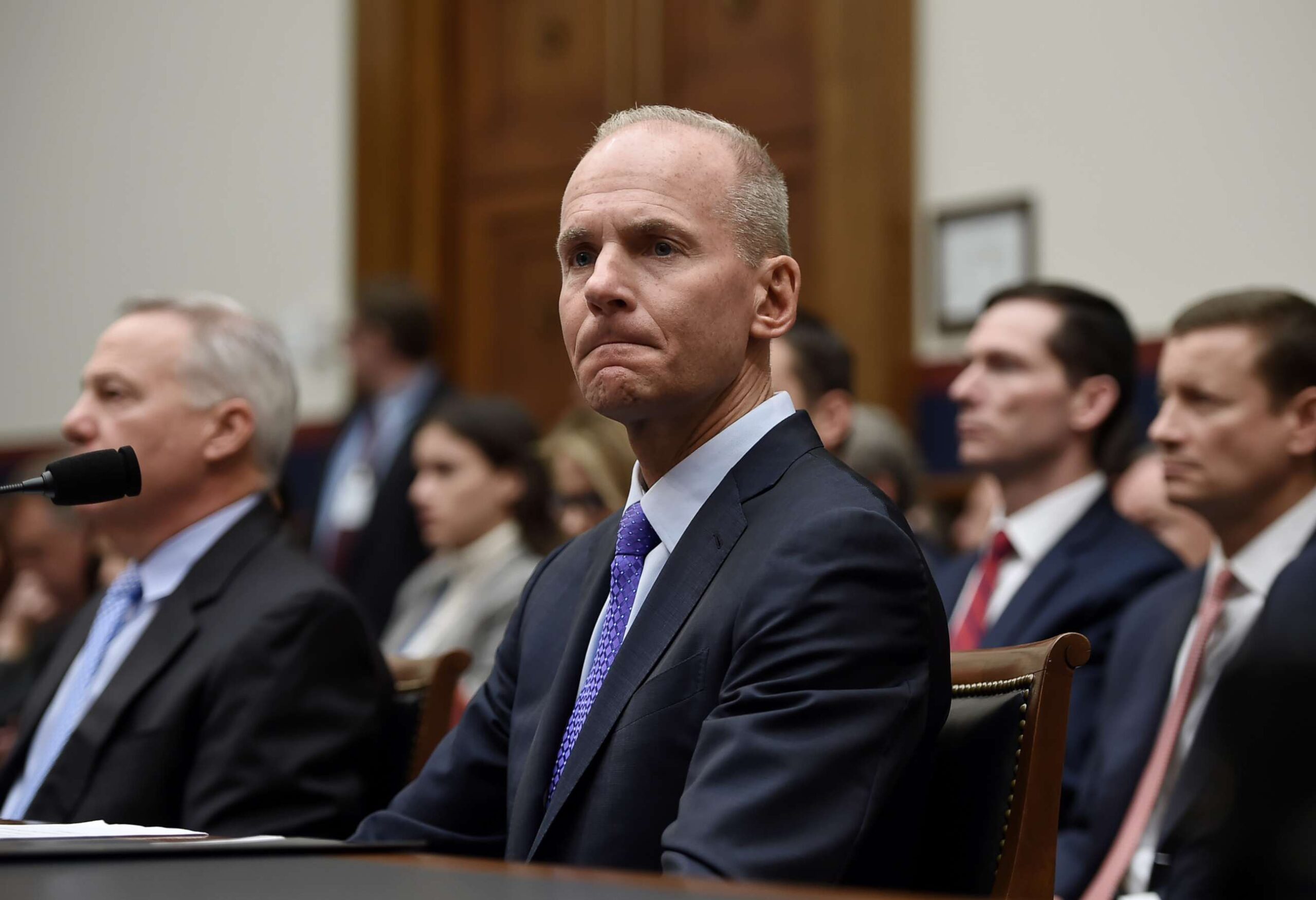 Former Boeing CEO Dennis Muilenburg testifying in a hearing
