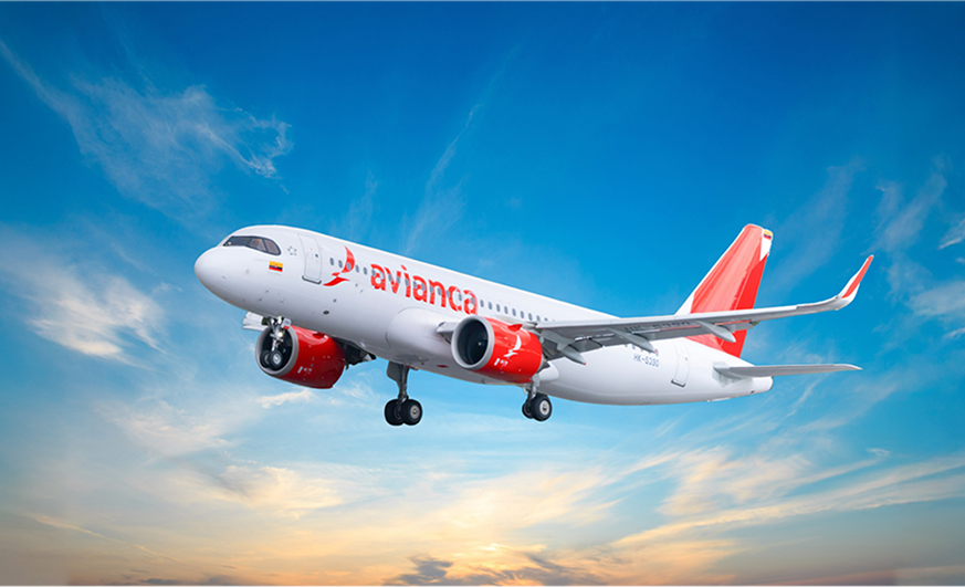 Avianca aircraft in flight at sunrise