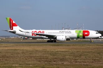TAP Air Portugal Airbus A330-900neo in special 100th anniversary livery taxiing on runway