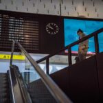 Image of traveller in airport terminal, taken on the 9th of August 2021.