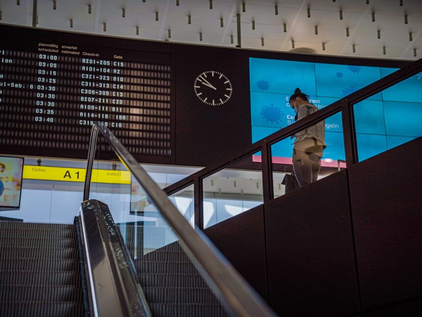 Image of traveller in airport terminal, taken on the 9th of August 2021.