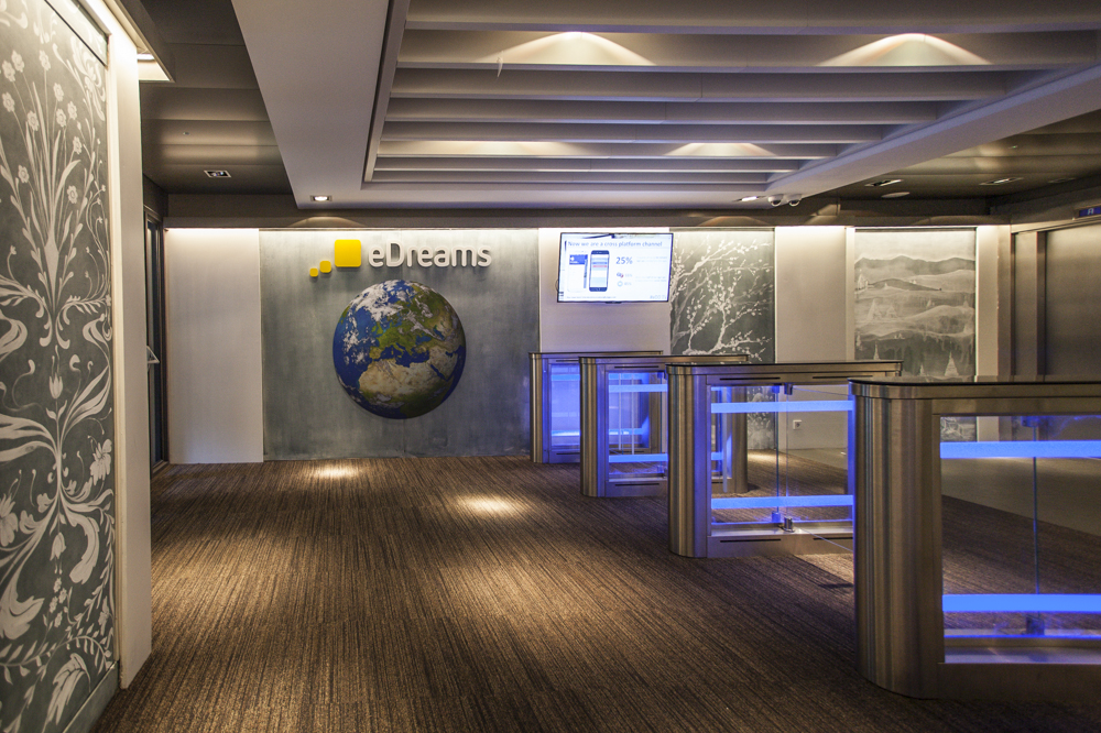 Inside the eDreams offices, with the logo on the wall.