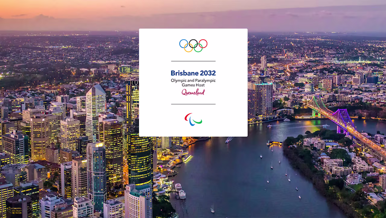 An image of the Austlria city of Brisbane with white box and writing say it being the host city of the Olympics in front of it