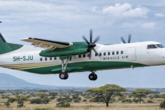 Miracle Air Dash 8 aircraft flying over the Safari.