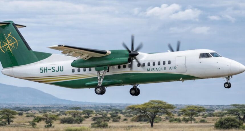 Miracle Air Dash 8 aircraft flying over the Safari.