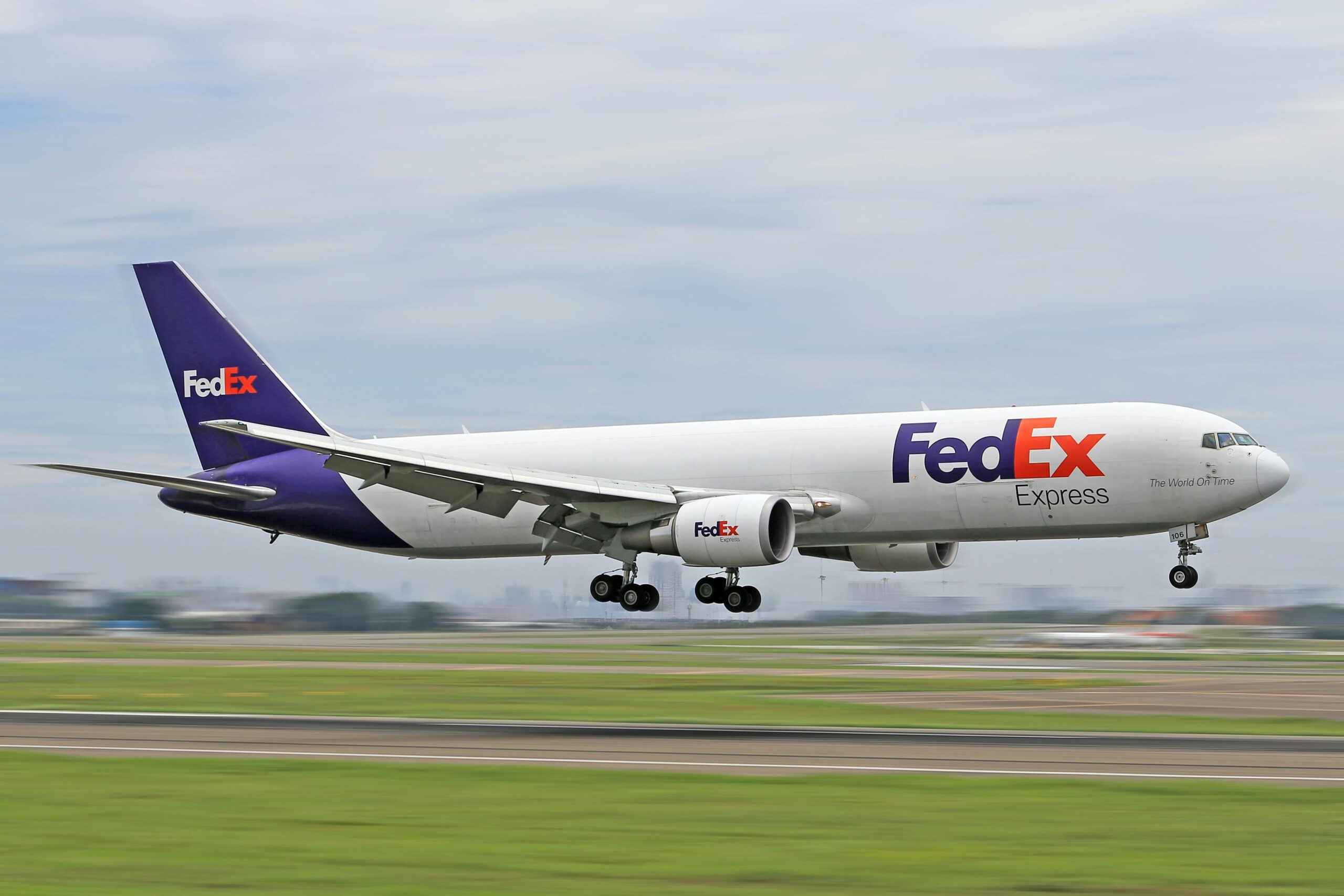 A FedEx plane coming in for landing.