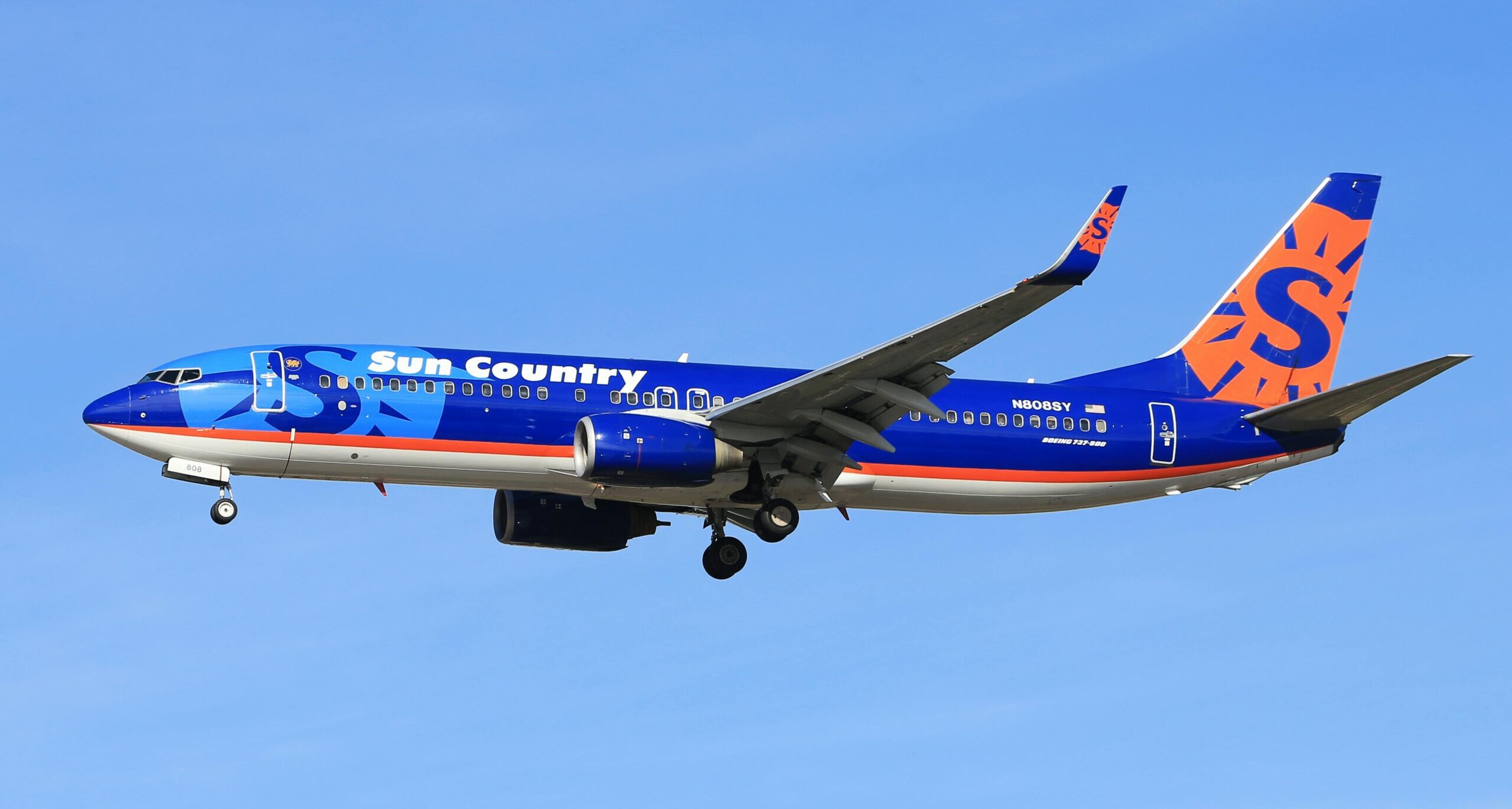 A Sun Country Airlines passenger plane in flight