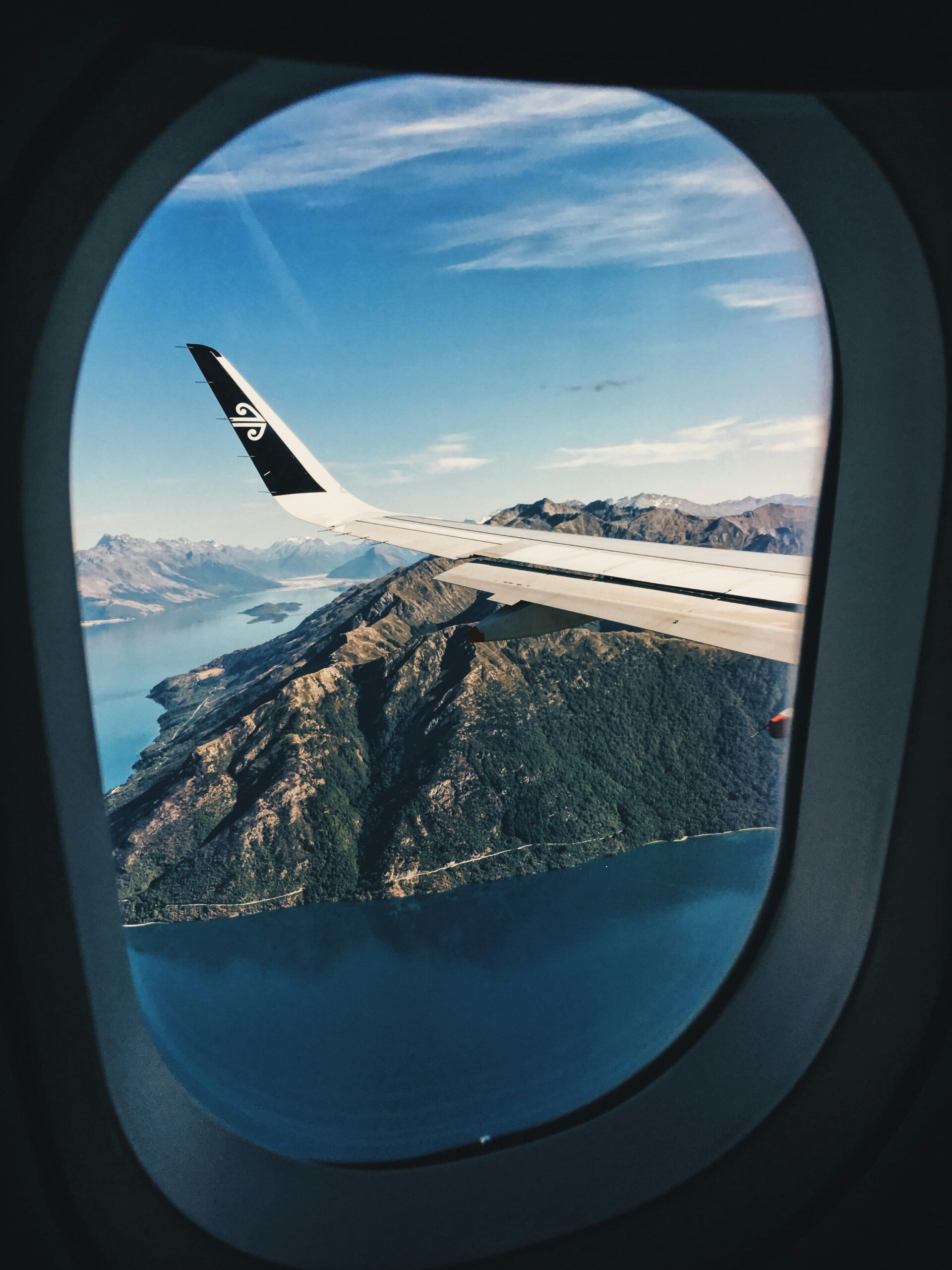 Mountains on islands visible from a aircraft window