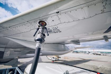 Preparations for an Airbus A320 to be refuelled on the tarmac.