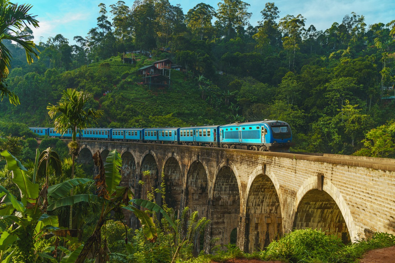 Iconic train passing over Nine Arch Bridge in Demodara, Ella, Sri Lanka.