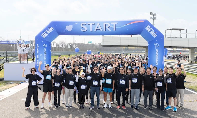 Participants posing for a commemorative photo at the charity event
