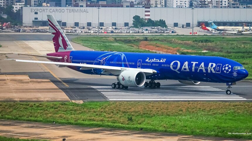 A blue and red Qatar Airways aircraft gets ready for takeoff