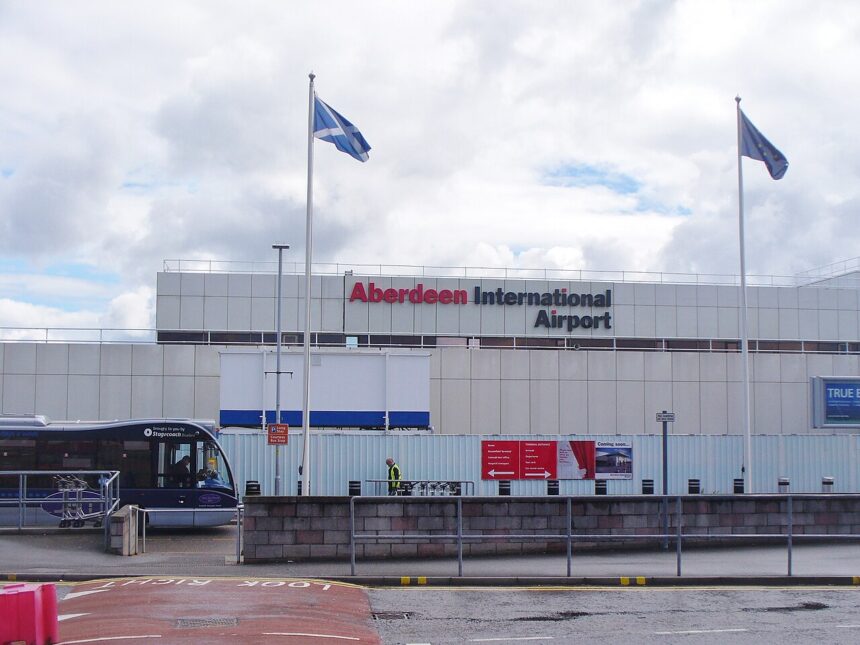 Aberdeen International Airport from the outside parking lot. There is a bus on the left hand side.
