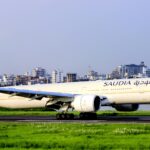 Saudia Airlines Boeing 777 on the runway on a clear day