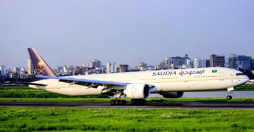 Saudia Airlines Boeing 777 on the runway on a clear day