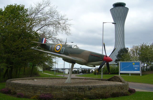 A wide shot of the 603 Squadron Spitfire Memorial gate guardian at Edinburgh Airport
