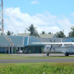 Funafuti International Airport (IATA: FUN, ICAO: NGFU) in Tuvalu. A Fiji Link aircraft is visible on the runway.