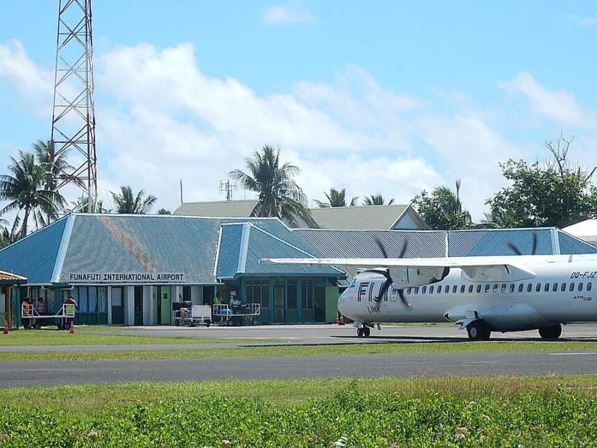 Funafuti International Airport (IATA: FUN, ICAO: NGFU) in Tuvalu. A Fiji Link aircraft is visible on the runway.