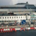 A high-angle view of Hangar 4 at Dublin Airport, showing the large-scale industrial architecture of the aircraft maintenance facility during a period of infrastructure upgrades.