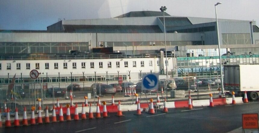 A high-angle view of Hangar 4 at Dublin Airport, showing the large-scale industrial architecture of the aircraft maintenance facility during a period of infrastructure upgrades.