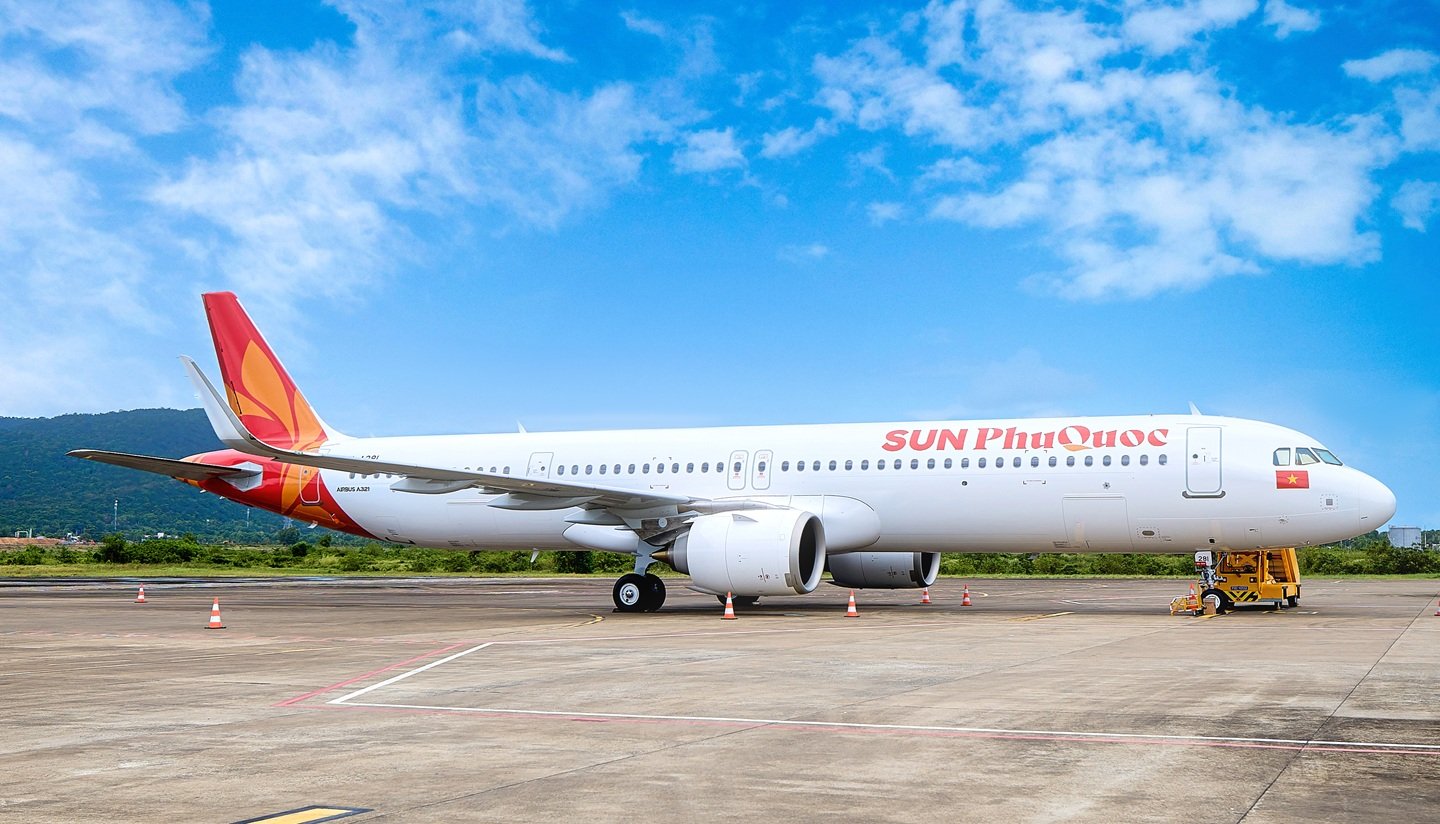 Sun PhuQuoac Airbus aircraft on the tarmac. Blue sky in the background.