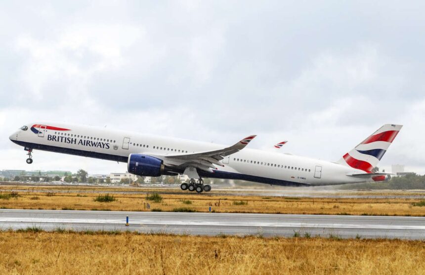 British Airway plane in the centre of the image taking off (facing towards the left). It has the British Airway flag logo on the tail. It is an overcast day in the background