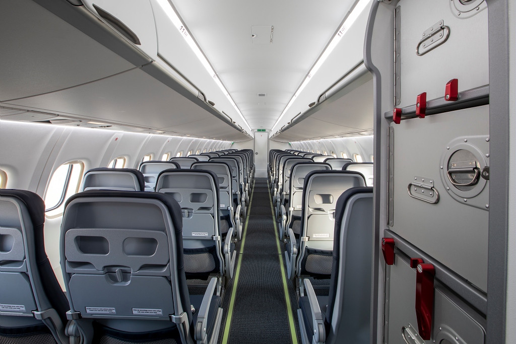 This image captures the Armonia cabin of an ATR 72-600, with a modern interior for this regional turboprop aircraft.