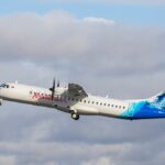This image shows an ATR 72-600 turboprop aircraft operated by Maldivian, the national airline of the Maldives