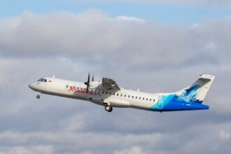 This image shows an ATR 72-600 turboprop aircraft operated by Maldivian, the national airline of the Maldives