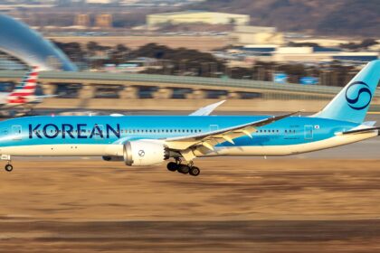 A Korean Air Boeing 787-9 Dreamliner aircraft captured during landing at Taipei International Airport with an American Airlines aircraft in the apron area