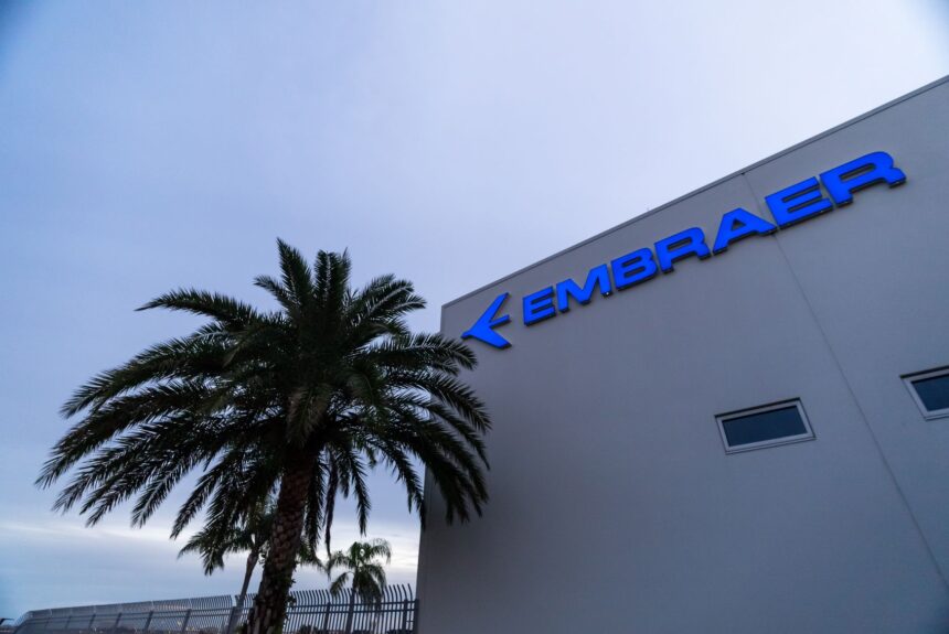 Embraer headquarters in Melbourne Australia with a palm tree
