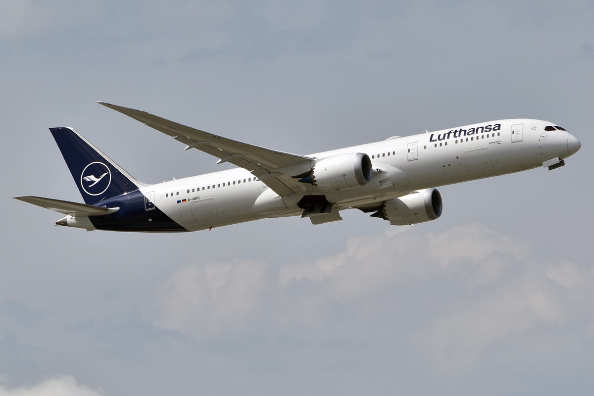 Lufthansa, D-ABPC, Boeing 787-9 Dreamliner flying in the cloudy sky. Blue and white livery.
