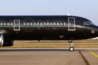 Beond A321 aircraft featuring the main fuselage area in black livery captured at a taxiway