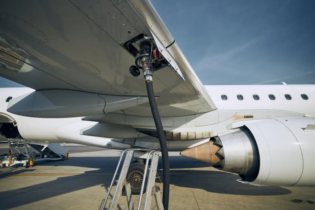 Image of an aircraft undergoing ground refuelling at an airport