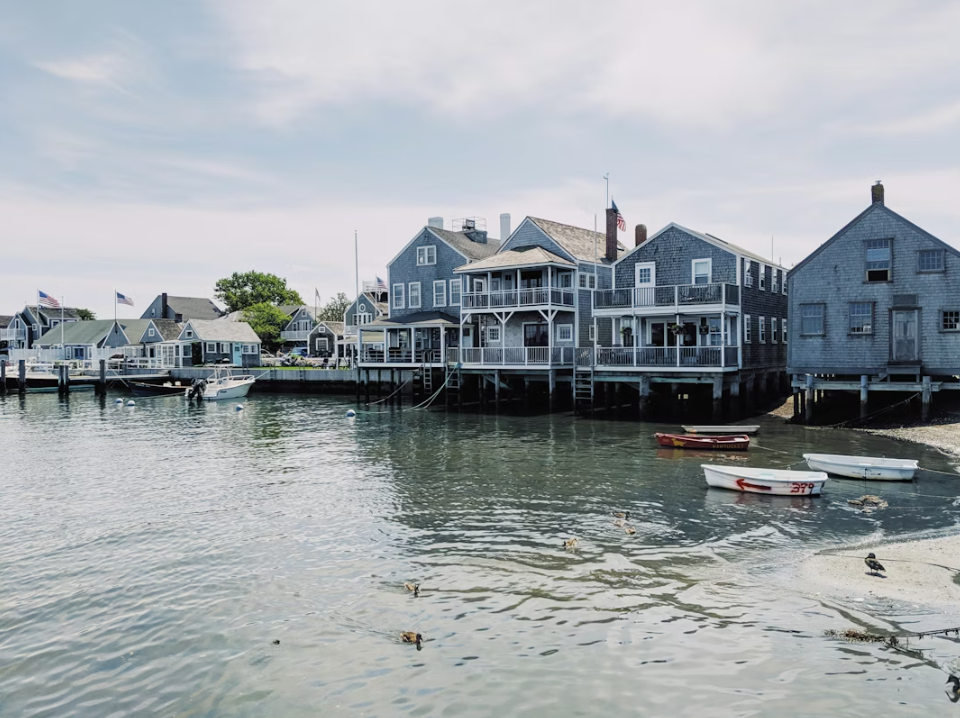 Black and white buildings on a waterfront during daytime