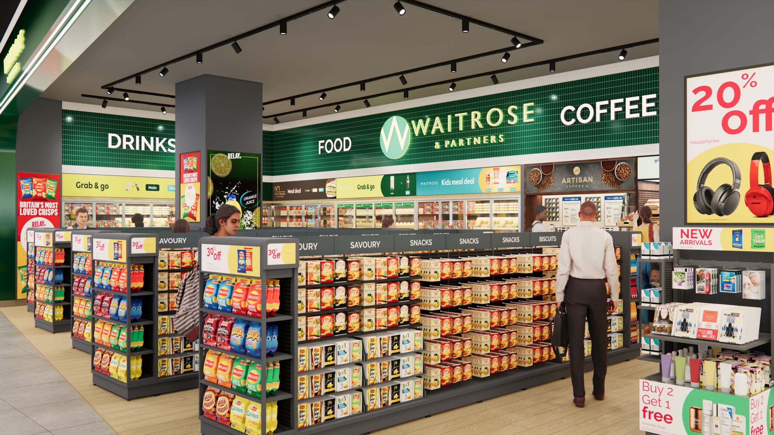 the image shows a small airport Waitrose store from an angle - the back corner of the store is in the centre left of the image. A person walks in front of the shelves with their back to the camera. Different food displays can be seen on shelves, and the green and white Waitrose logo is along the top. 