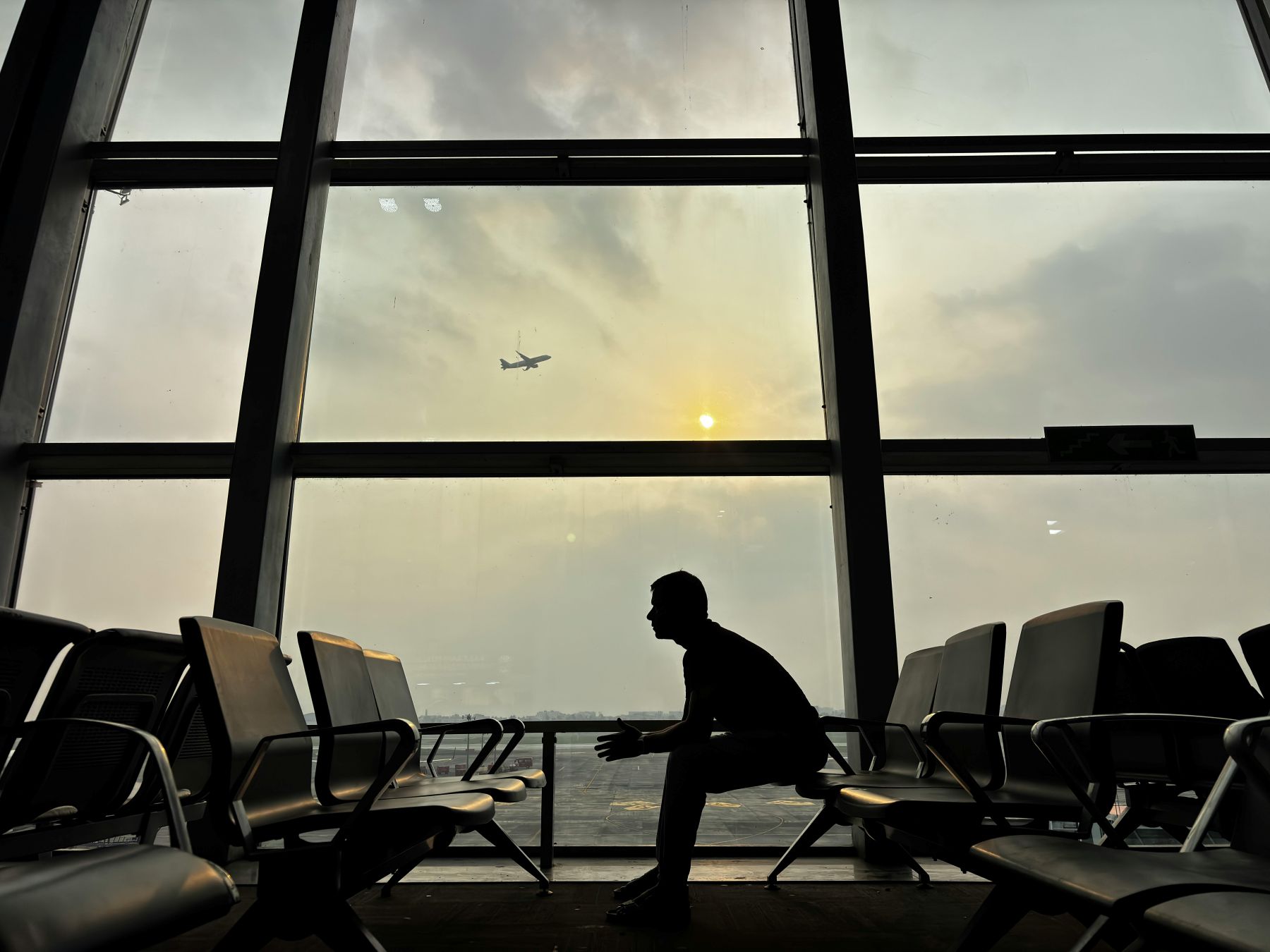 Silhouette of Man in Kolkata Airport Terminal