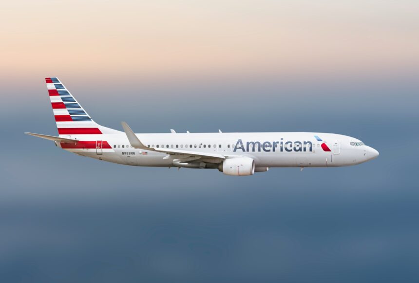 American Airlines Boeing 738 flying through the sky.