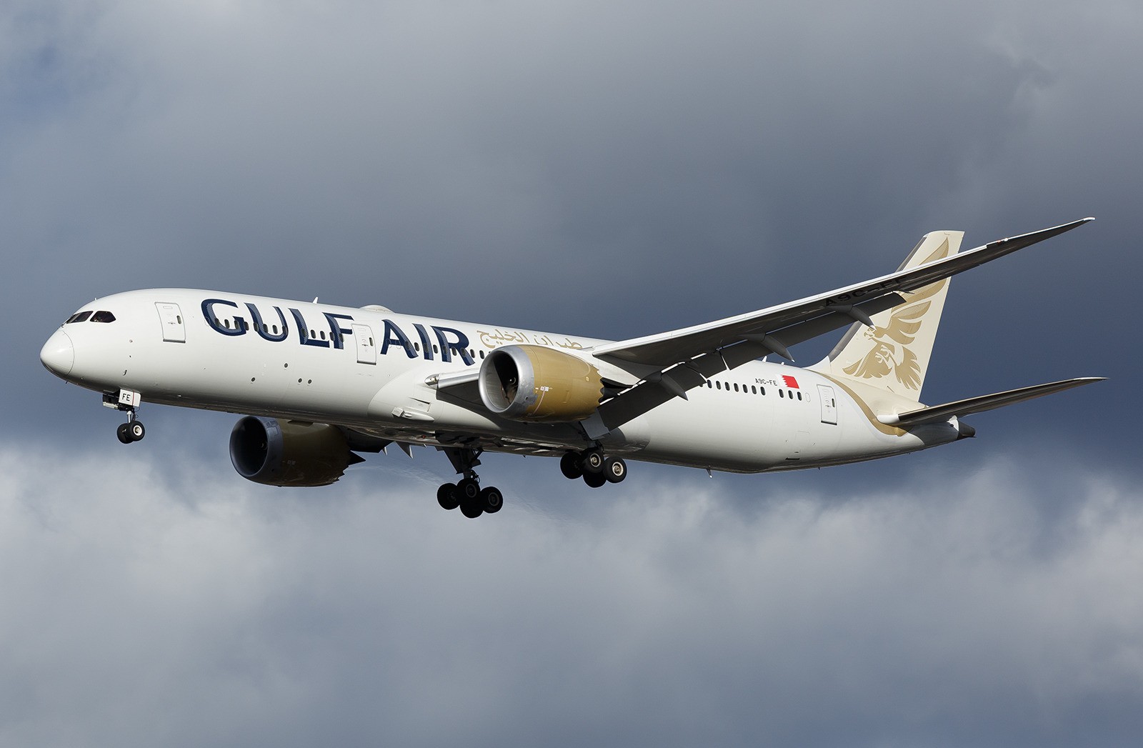 A Gulf Air B787 captured during landing at London Heathrow Airport during an overcast weather.