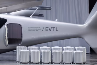 Vertical Aerospace's prototype of Valo the air taxi, the tail is showing and reads "EVTL" on the side in black.