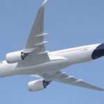A modern long-haul aircraft begins its journey from Toulouse, highlighting Lufthansa’s newer-generation fleet in action. Blue sky in the background.