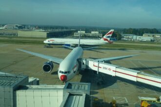 Image shows British Airways plane boarding at London Gatwick airport in 2012