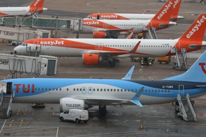 TUI-operated Boeing 737 MAX 8 aircraft with the UK registration G-UZMH.