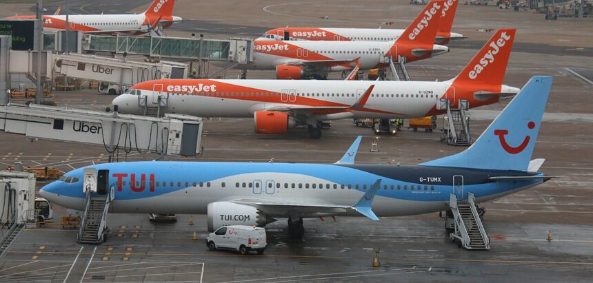 TUI-operated Boeing 737 MAX 8 aircraft with the UK registration G-UZMH.