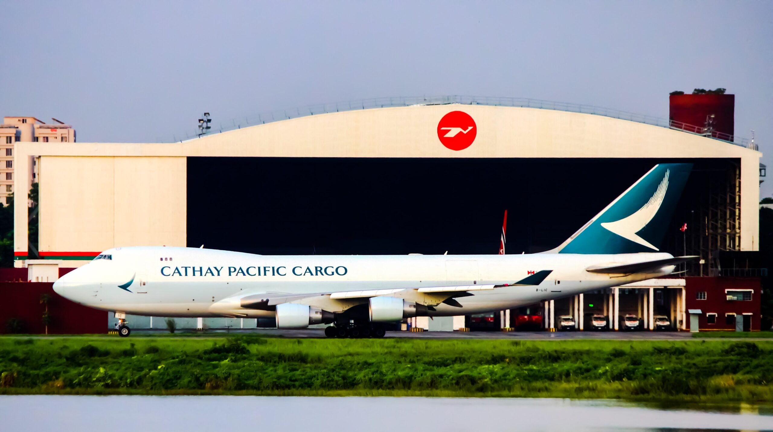 Cathay Pacific Cargo Boeing 747F in front of a maintenance hangar